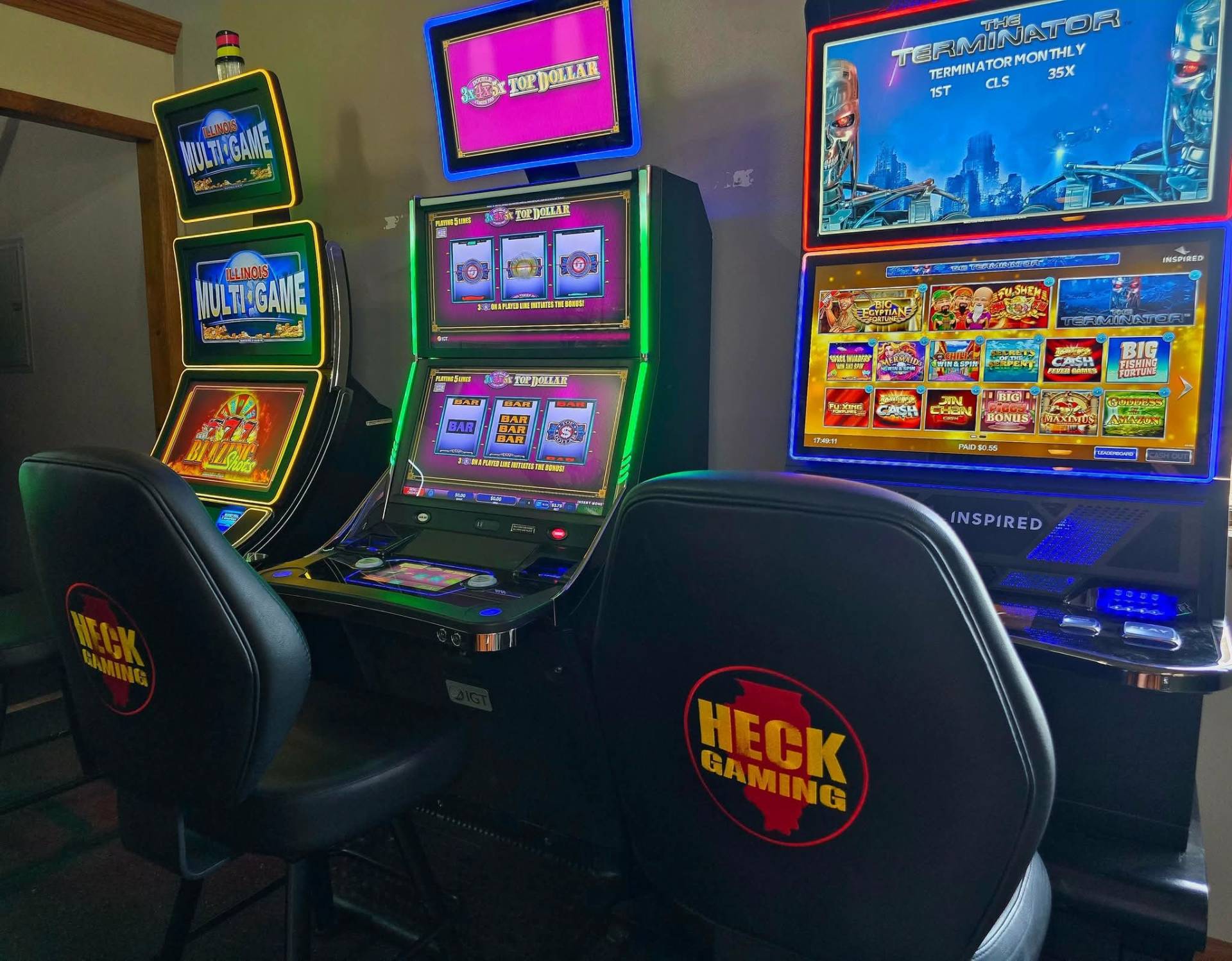 Top Dollar, Terminator and Multi-Game slot cabinets in a Heck Gaming lounge